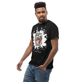 Black male model wearing Finish Here Tee by Daddy's Secret Toolbox. Black tee with original artwork. Antique drawing of mustache man with mouth wide open anticipating a facial. 
