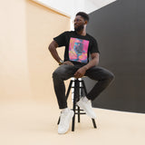 Rogue Randy Tee by Daddy's Secret Toolbox is a butch daddy with a hot pink tint with yellow and teal accents. Randy is muscular, bearded and wearing aviator sunglasses. He's Hot. 