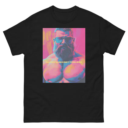 Rogue Randy Tee by Daddy's Secret Toolbox is a butch daddy with a hot pink tint with yellow and teal accents. Randy is muscular, bearded and wearing aviator sunglasses. He's Hot. 