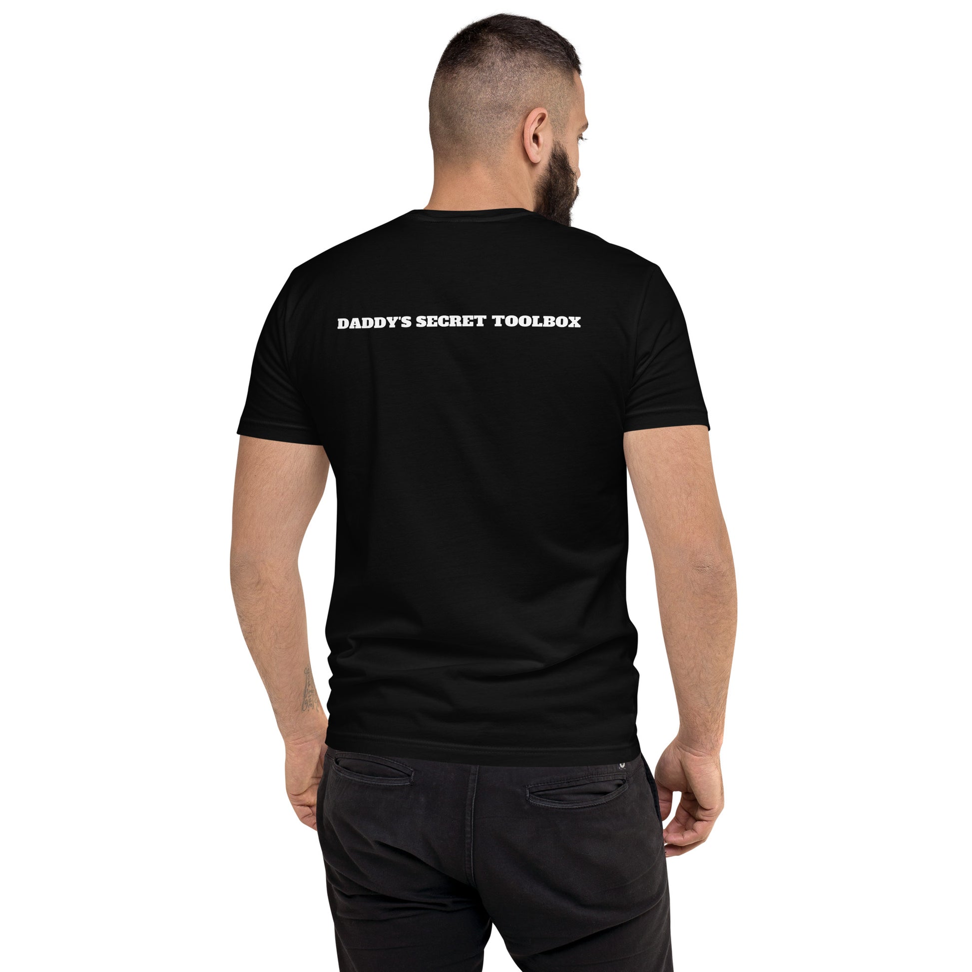 Black t-shirt worn by a gay man, emblazoned with the empowering mantra 'We No Longer Go For Looks' in bold white letters