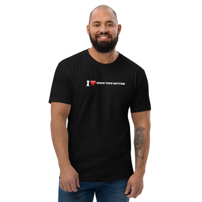Black t-shirt, featuring the playful phrase 'I love when tops bottom' in bold white letters with a red heart to symbolize the word love