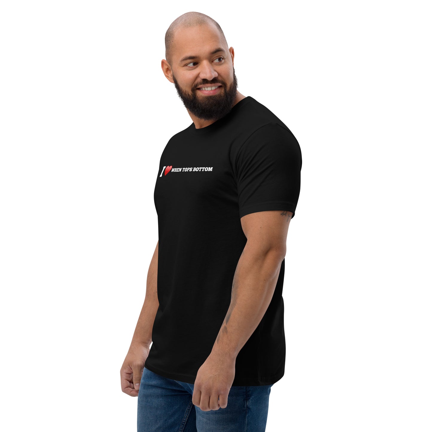 Black t-shirt, featuring the playful phrase 'I love when tops bottom' in bold white letters with a red heart to symbolize the word love