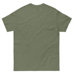 Gay muscular man with. beard rippling bulging muscles. T-shirt in a watercolor design great for dates the gym club wear going out. Super sexy fit. Army green back