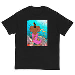 Black t-shirt with a vibrant graphic of a muscular merman covered in tattoos, swimming in a deep blue ocean.