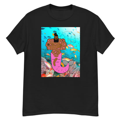 Black t-shirt with a vibrant graphic of a muscular merman covered in tattoos, swimming in a deep blue ocean.